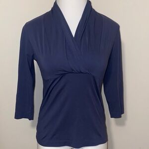 Women’s size Large Banana Republic navy blue blouse with V neck.